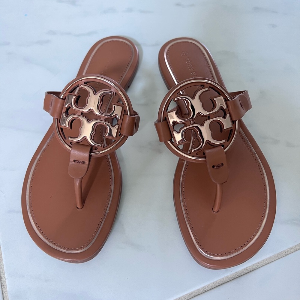 Tory Burch metal Miller sandals.